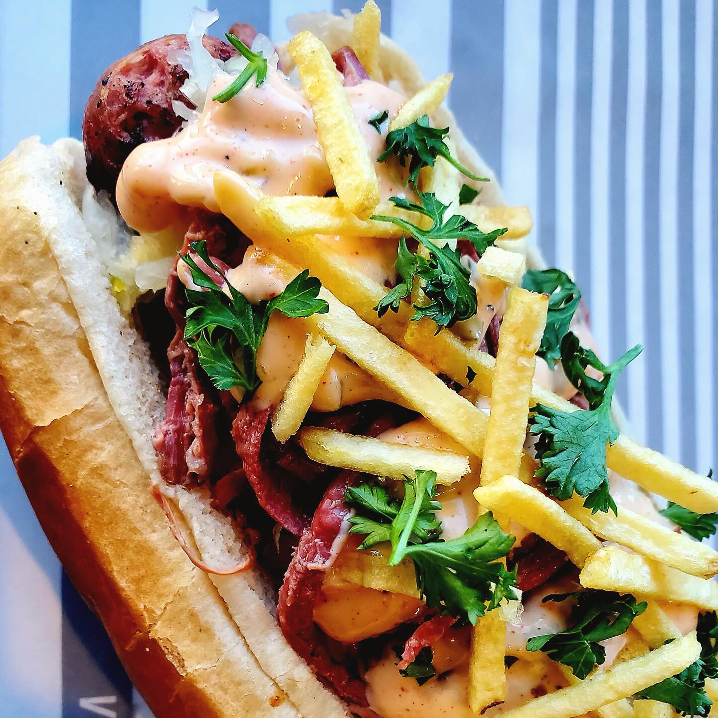 Loaded sausage with toppings