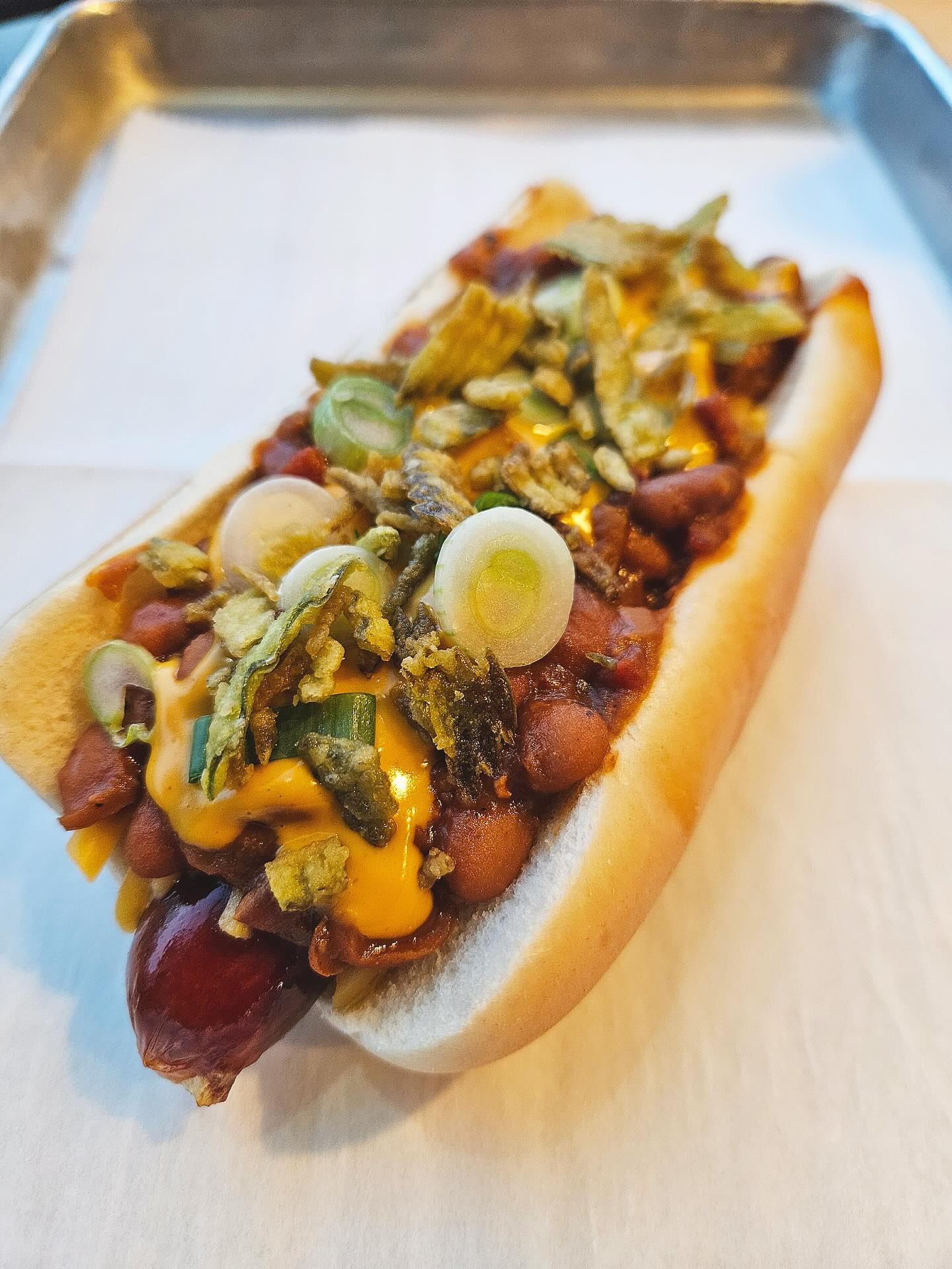 Chili cheese dog loaded with toppings
