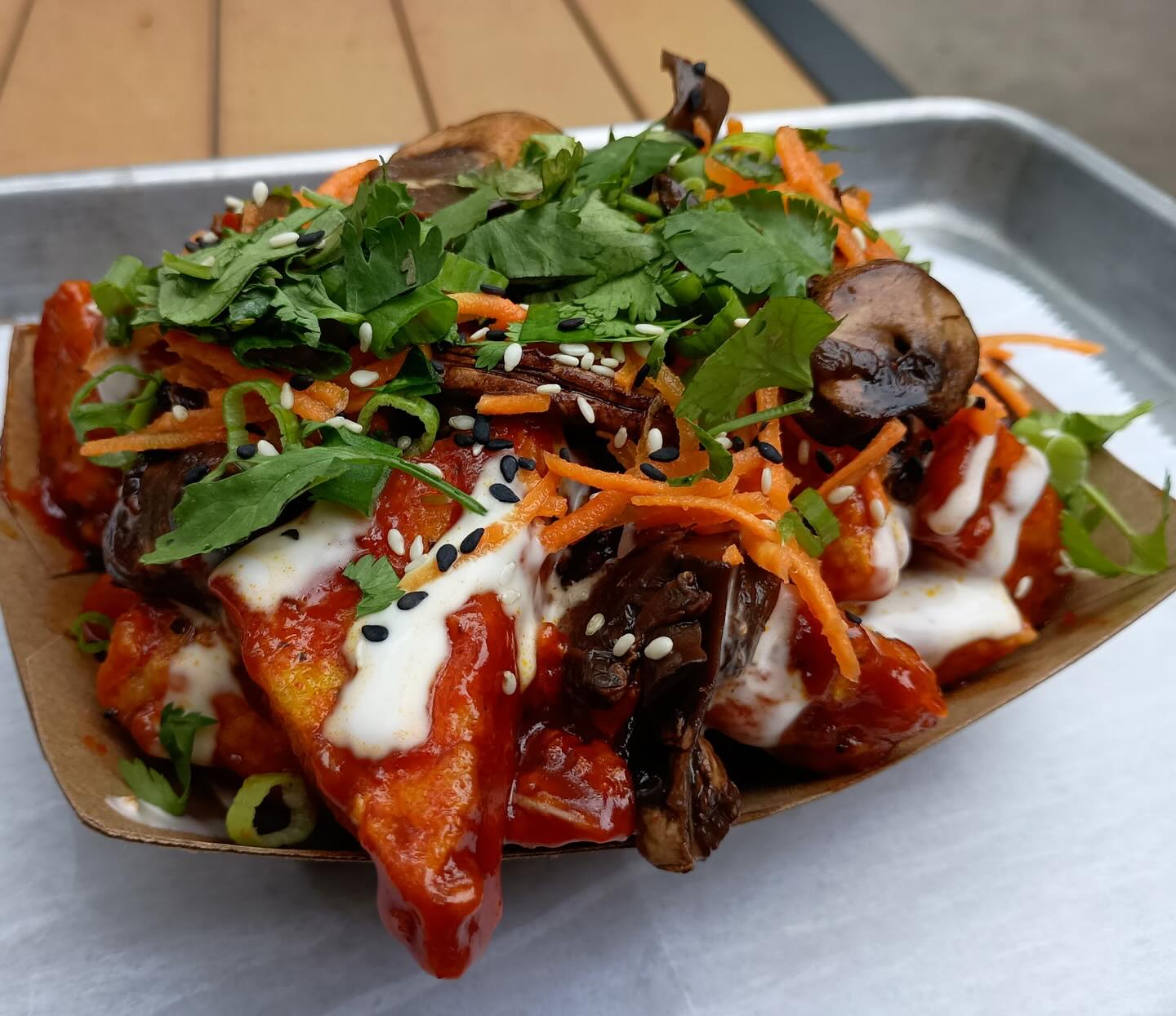 Loaded tofu with sauce and garnish