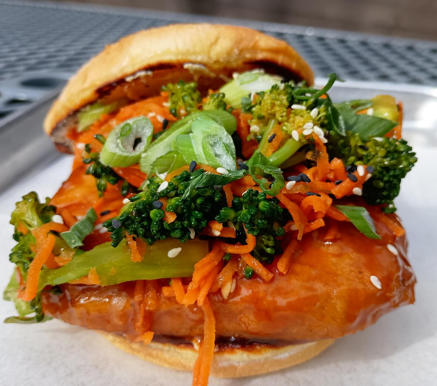 Teriyaki burger with toppings